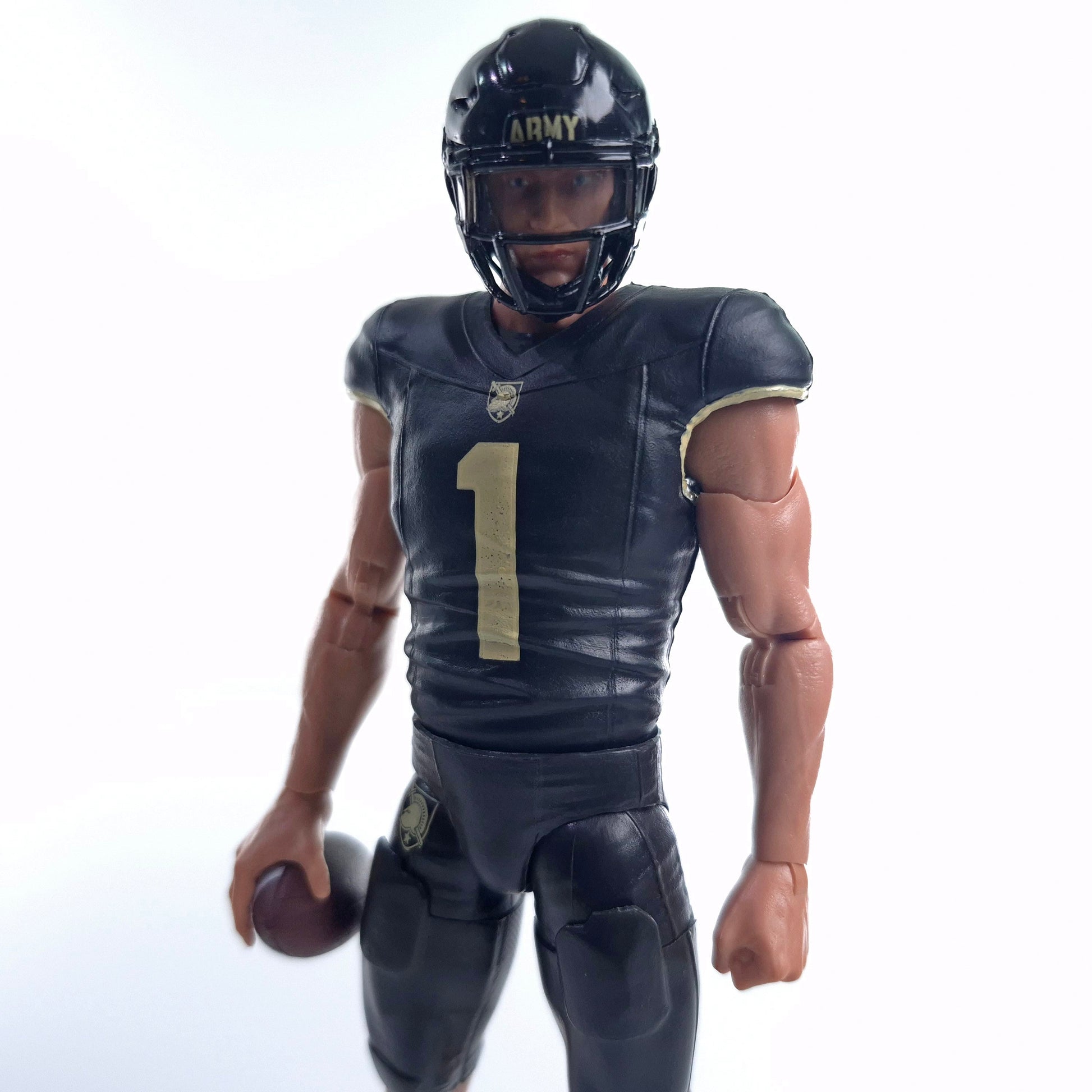 Collegiate Legends Army Football #1 action figure in black and gold uniform with helmet and football accessory