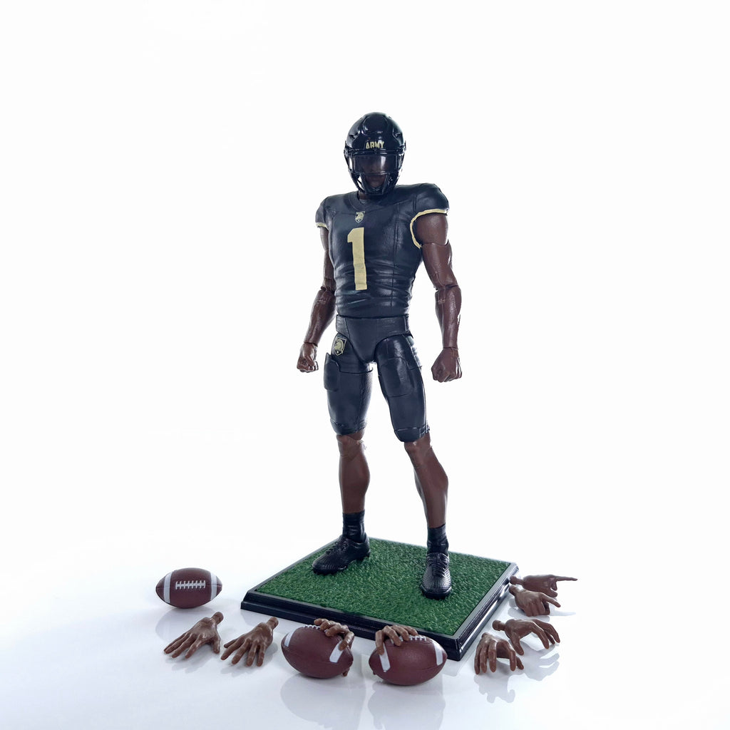Collegiate Legends Army football action figure in black and gold uniform with display stand, footballs, and hand sets.