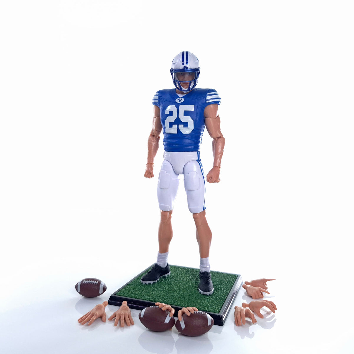 Collegiate Legends #25 BYU football action figure with display stand, interchangeable hands, and football accessories.