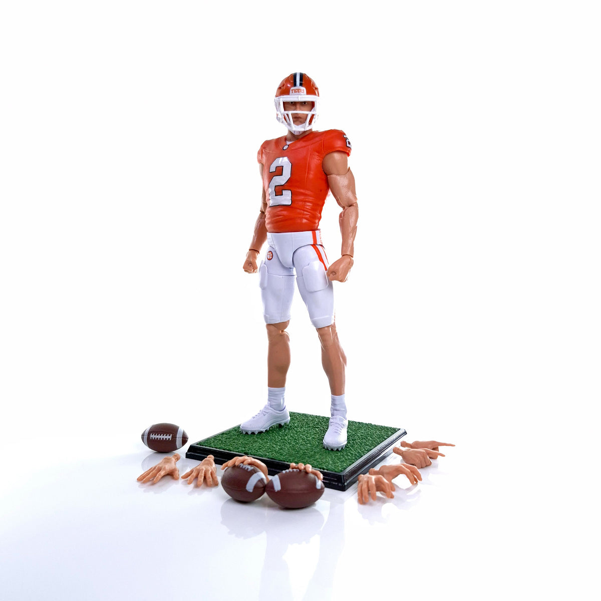 Collegiate Legends Cade Klubnik #2 Clemson action figure with football, display stand, and interchangeable hand sets.