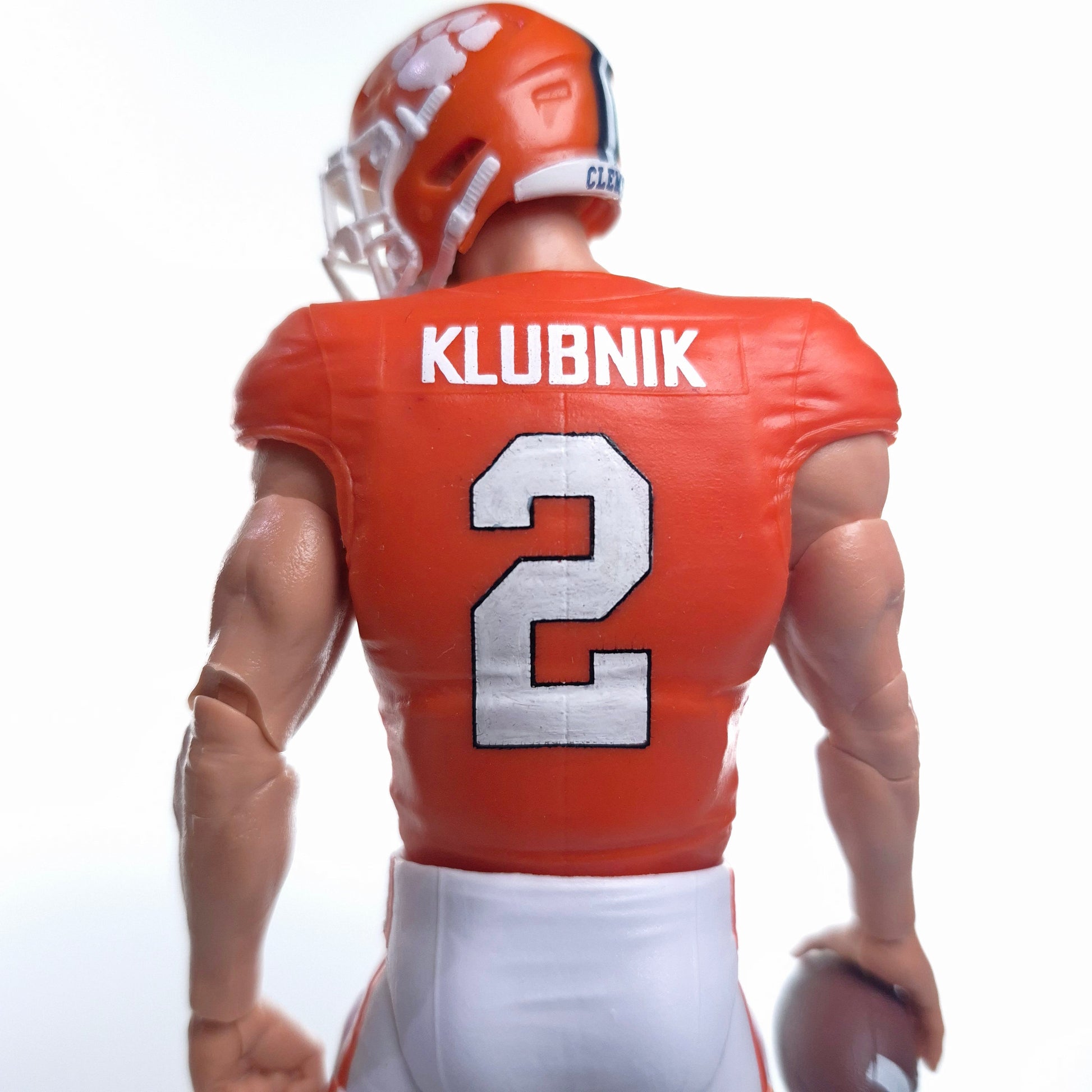 Collegiate Legends Cade Klubnik #2 Clemson action figure wearing an orange jersey with white number and helmet