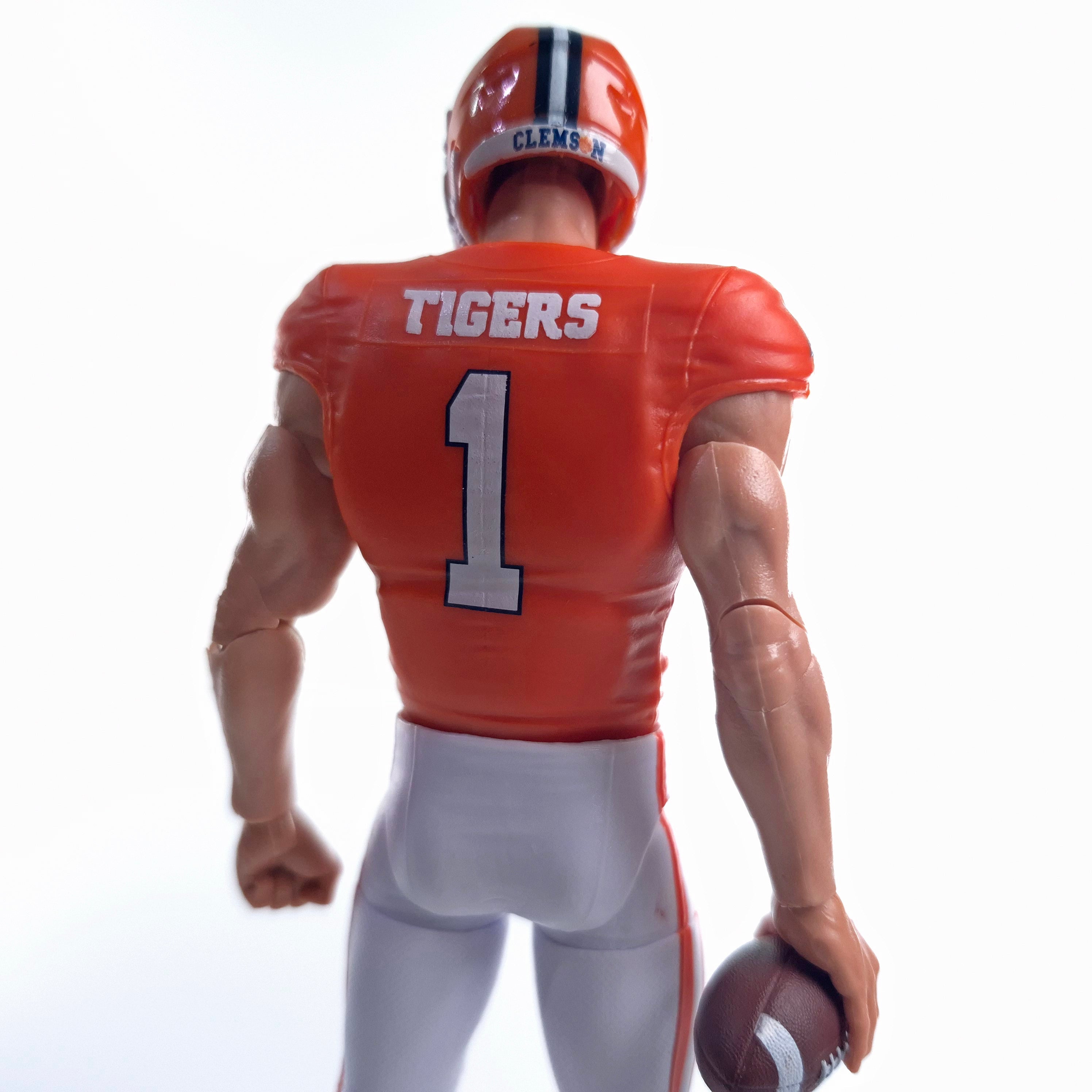 Collegiate Legends Clemson Tigers #1 football action figure in orange jersey and white pants, back view holding ball