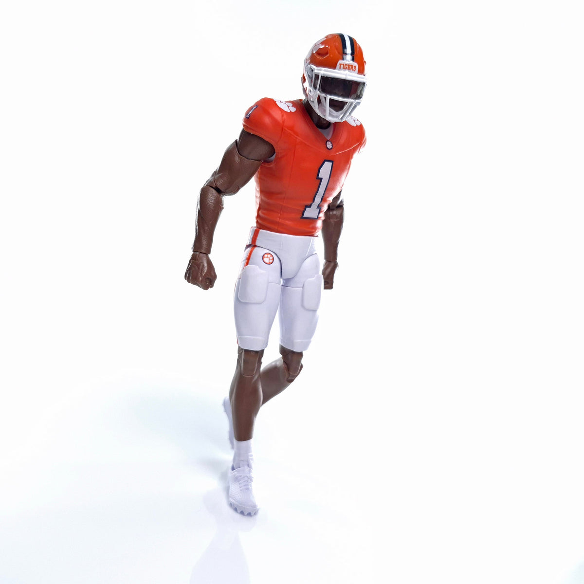 Collegiate Legends Clemson #1 football action figure in orange jersey and white pants with articulated limbs