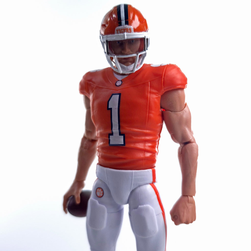 Collegiate Legends Clemson #1 football action figure in orange jersey and helmet holding a football on white background