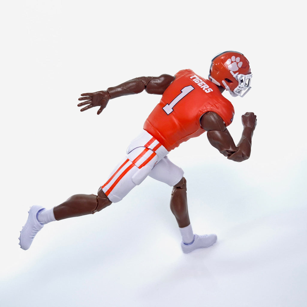 Collegiate Legends Clemson football action figure in orange #1 jersey running in a dynamic pose on white background
