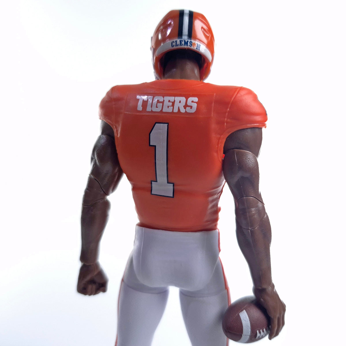 Collegiate Legends Clemson football action figure wearing orange jersey number 1 with helmet, back view