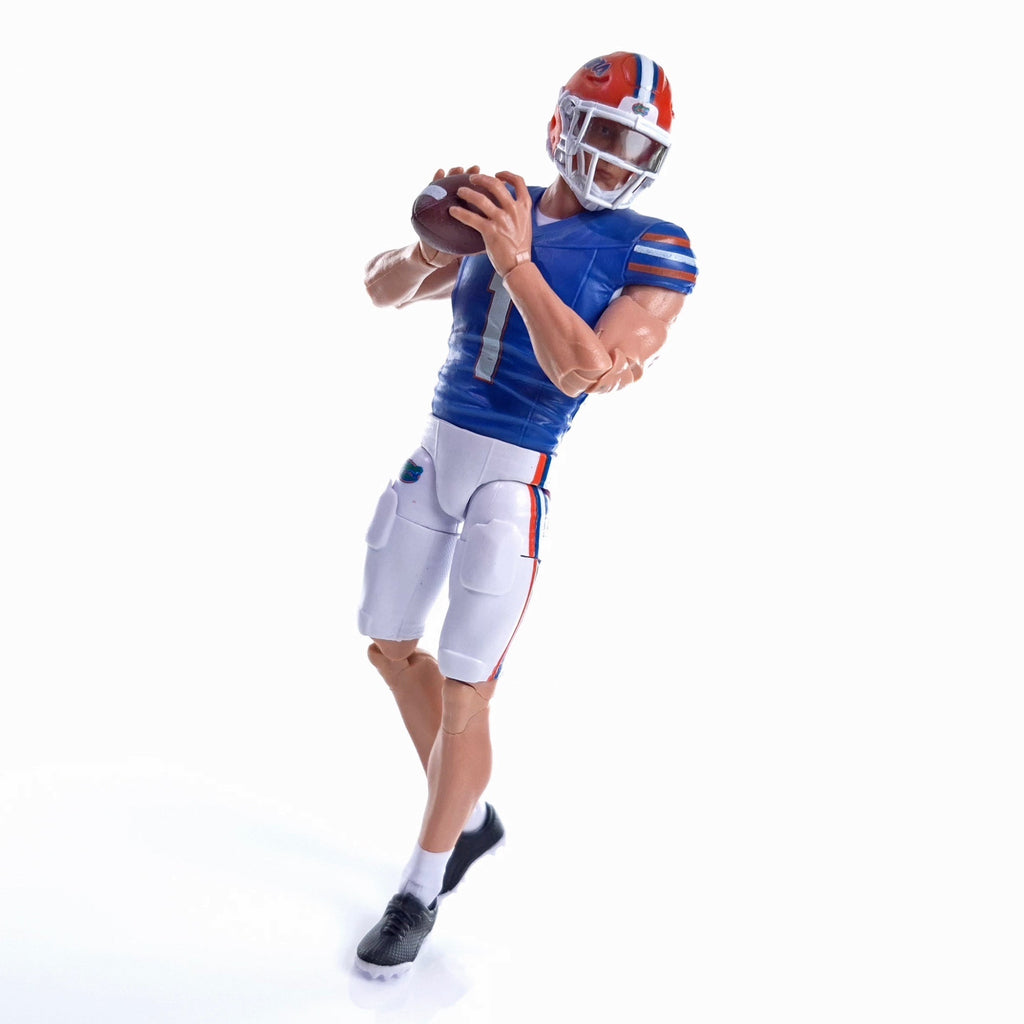 Collegiate Legends Florida football action figure in blue and orange uniform holding a football in a passing pose