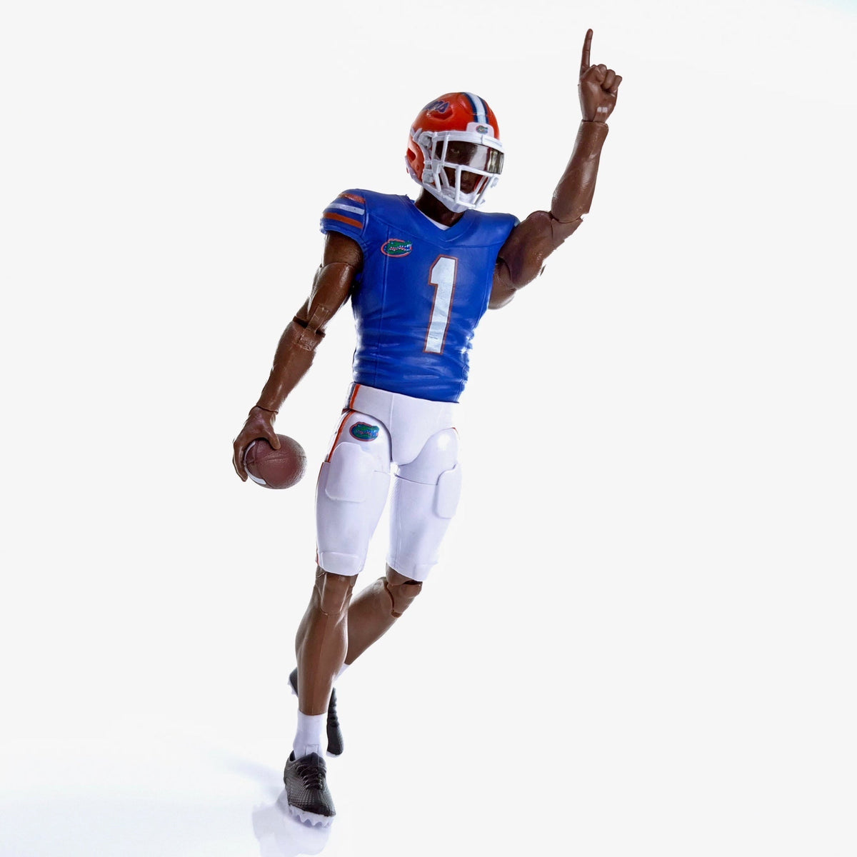 Collegiate Legends Florida Gators football action figure wearing a blue and white #1 jersey with a helmet and football.