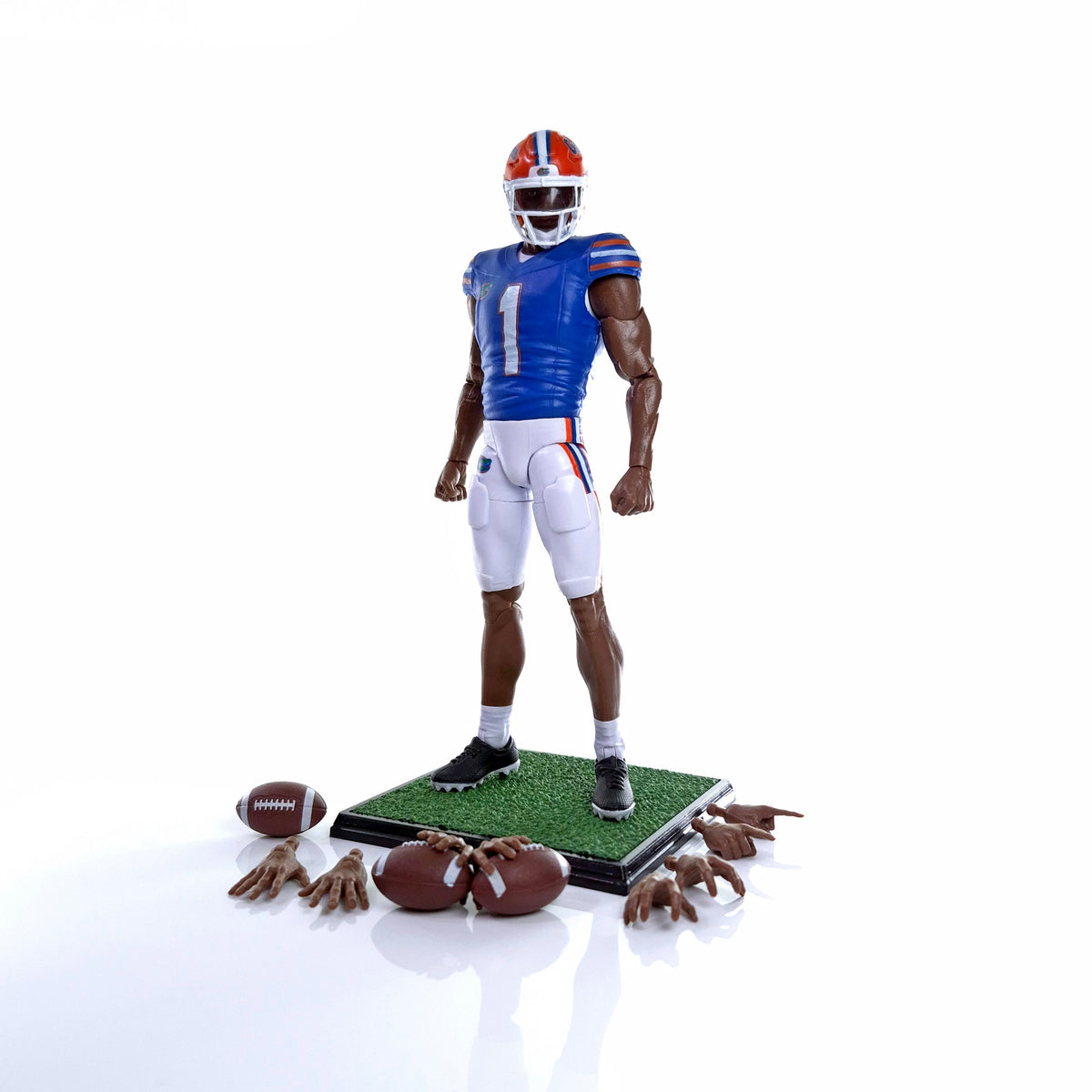 Collegiate Legends Florida Gators football action figure with articulated joints, display stand, and extra accessories.