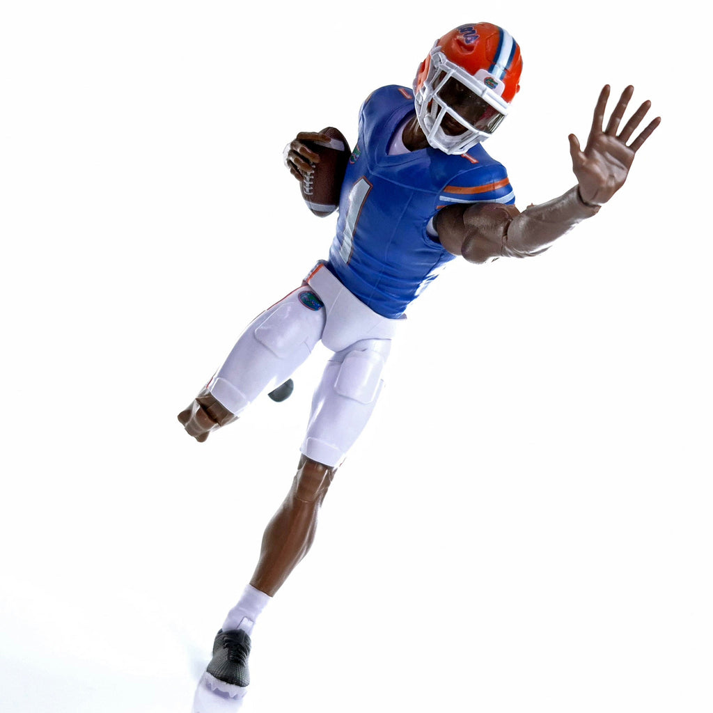 Collegiate Legends Florida Gators #1 football action figure in blue and orange uniform running with a football