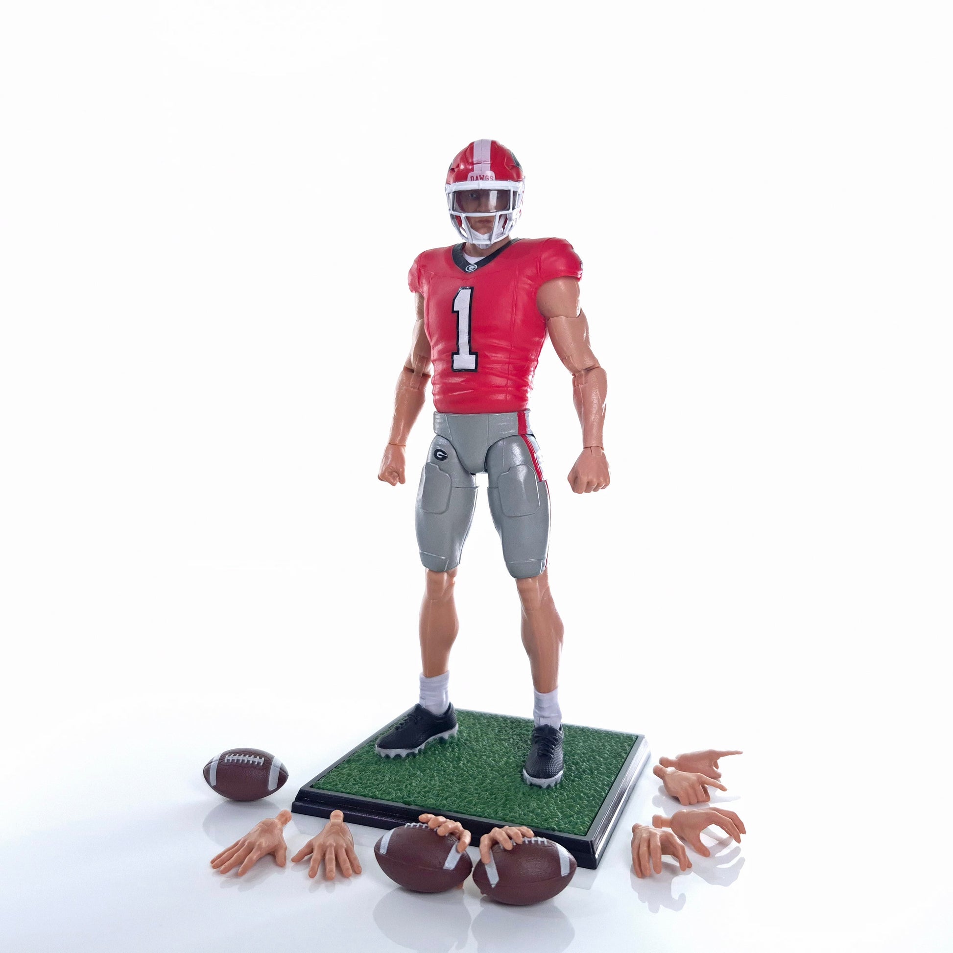 Collegiate Legends Georgia football action figure in red and black uniform with display stand and accessories