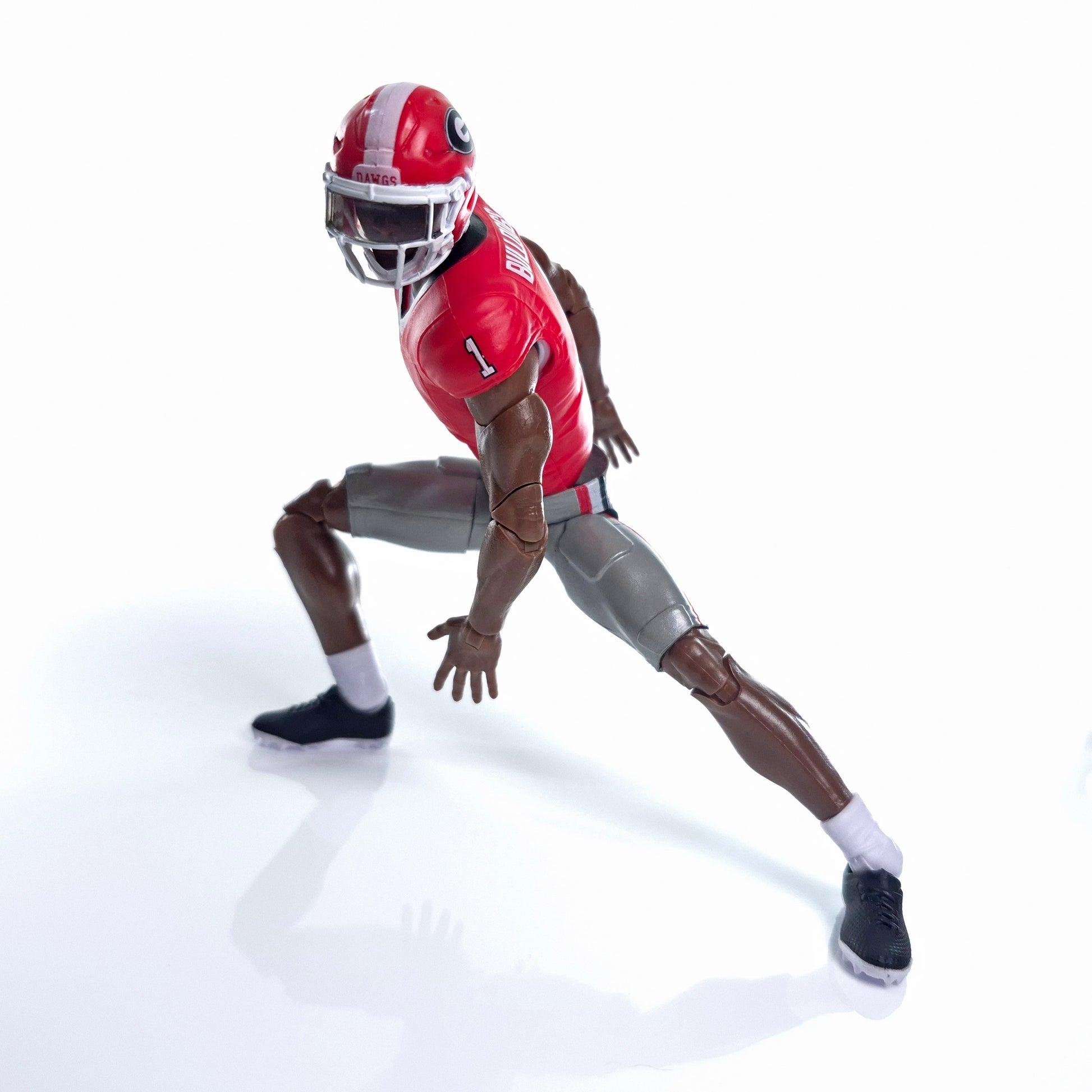 Collegiate Legends Georgia football player action figure in red and grey uniform with number 1 jersey in athletic pose