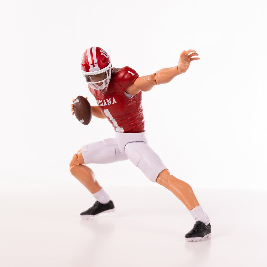 Collegiate Legends Indiana football action figure in red and white uniform throwing a football in a dynamic pose