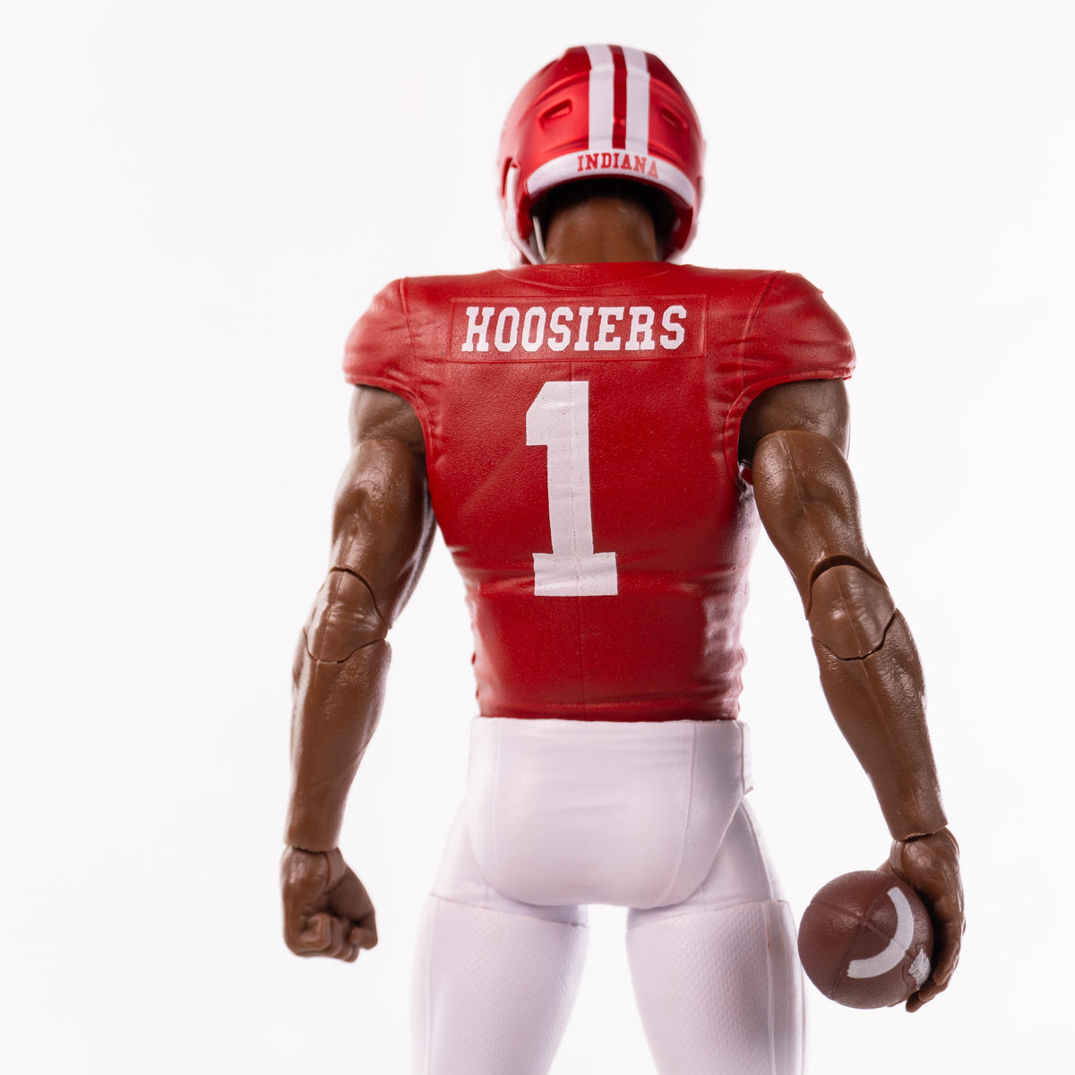 Collegiate Legends Indiana Hoosiers #1 football action figure with dark skin tone, seen from the back holding a ball.