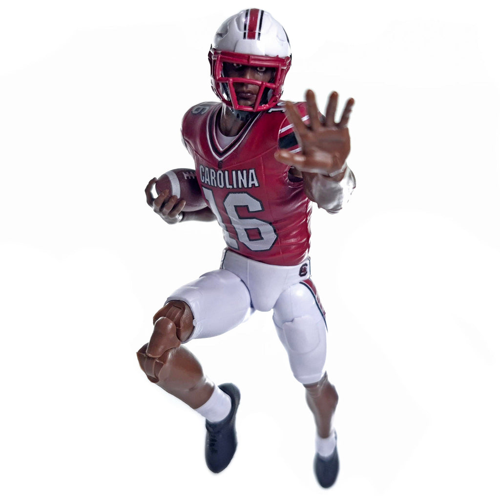Collegiate Legends LaNorris Sellers #16 action figure in South Carolina Gamecocks uniform running with a football