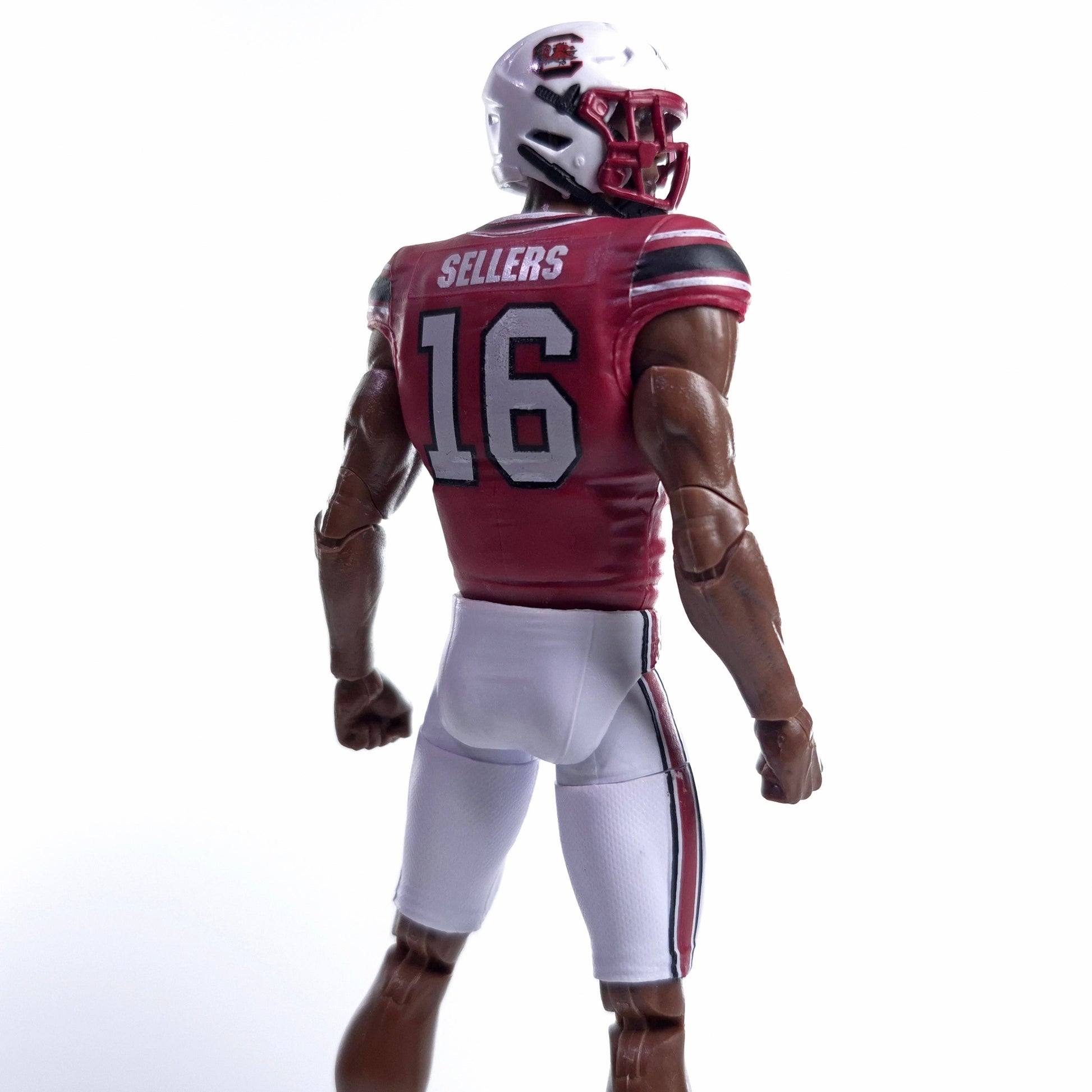 Collegiate Legends LaNorris Sellers #16 South Carolina Gamecocks action figure wearing a red and white football uniform