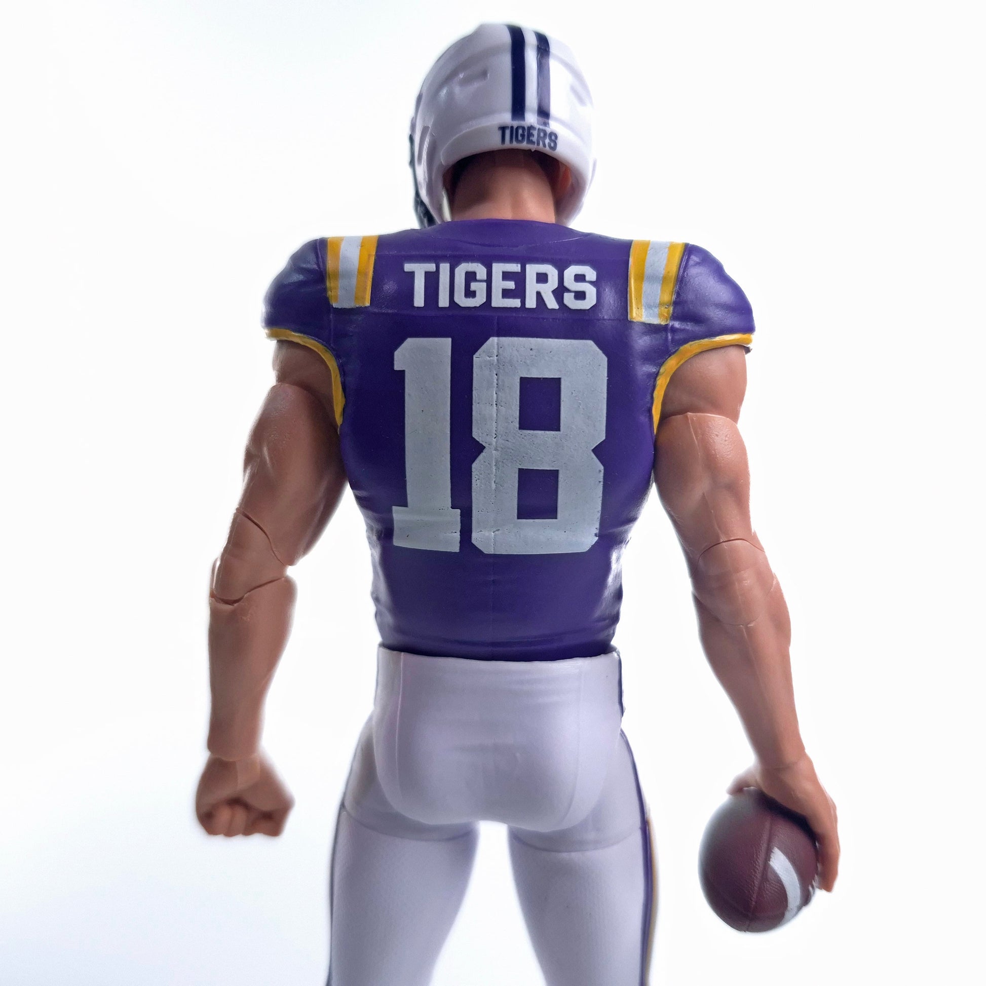 Back view of Collegiate Legends LSU #18 football action figure in purple and gold jersey holding a football
