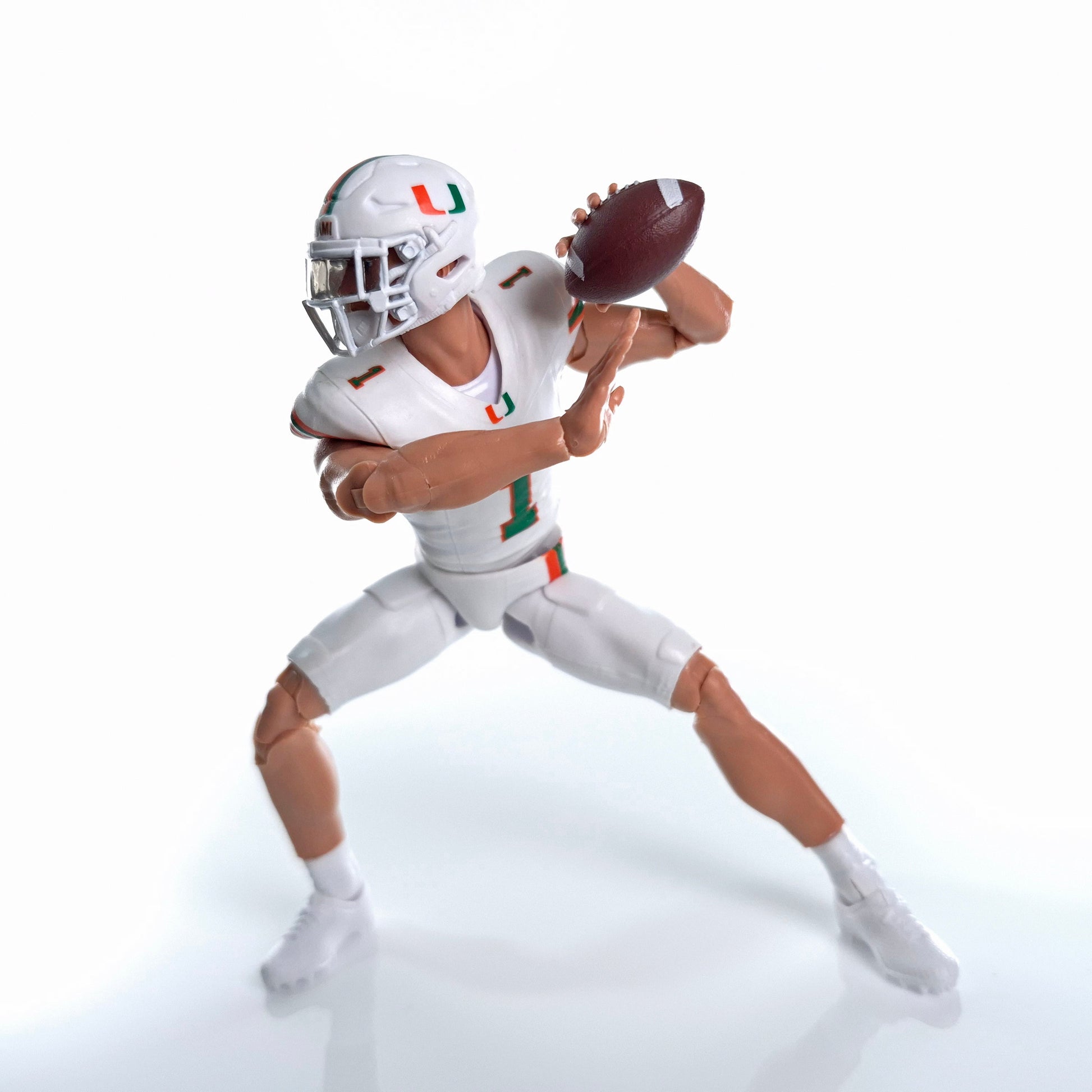 Collegiate Legends Miami Hurricanes #1 football action figure in white uniform throwing a football