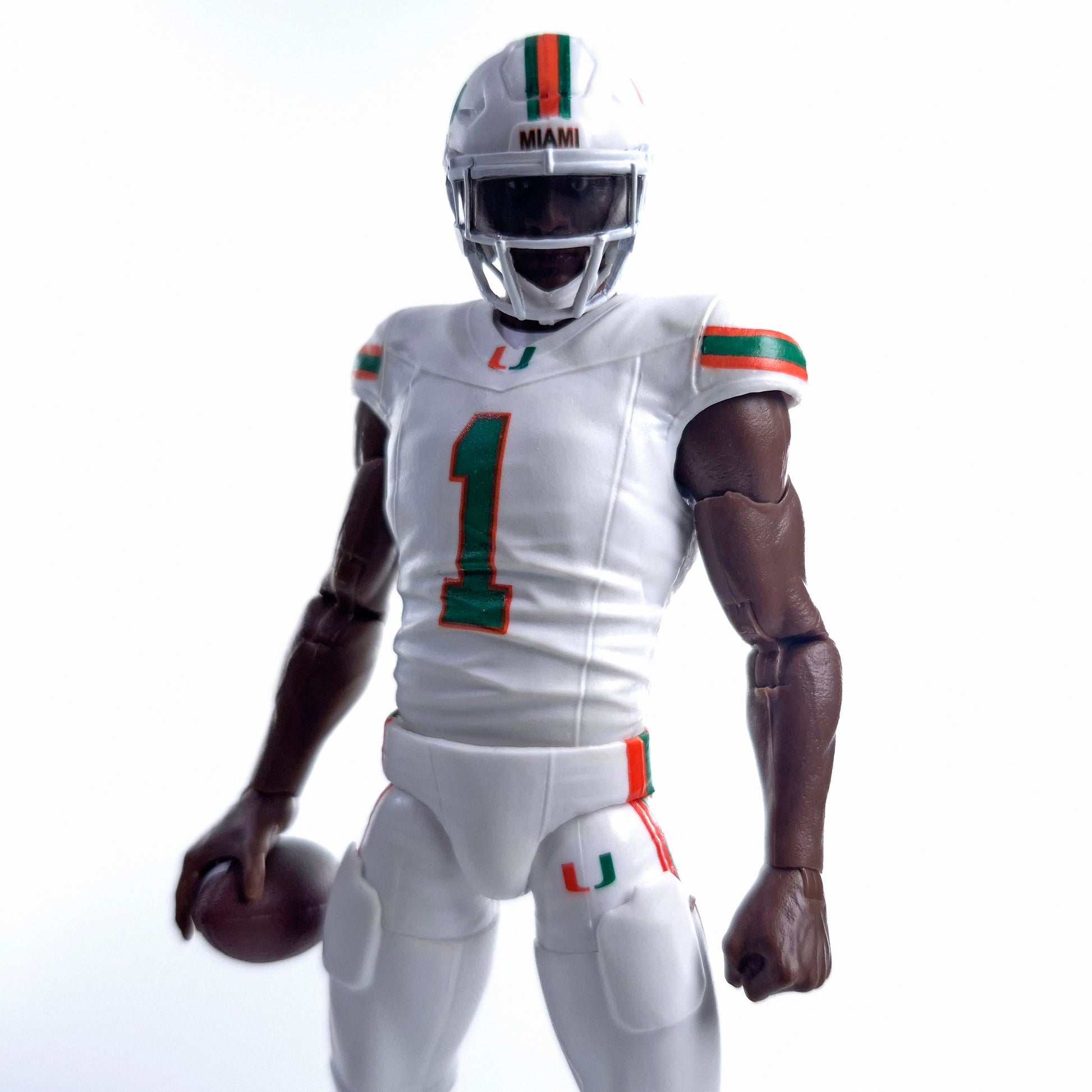 Collegiate Legends Miami Hurricanes #1 football action figure in a white uniform with orange and green accents