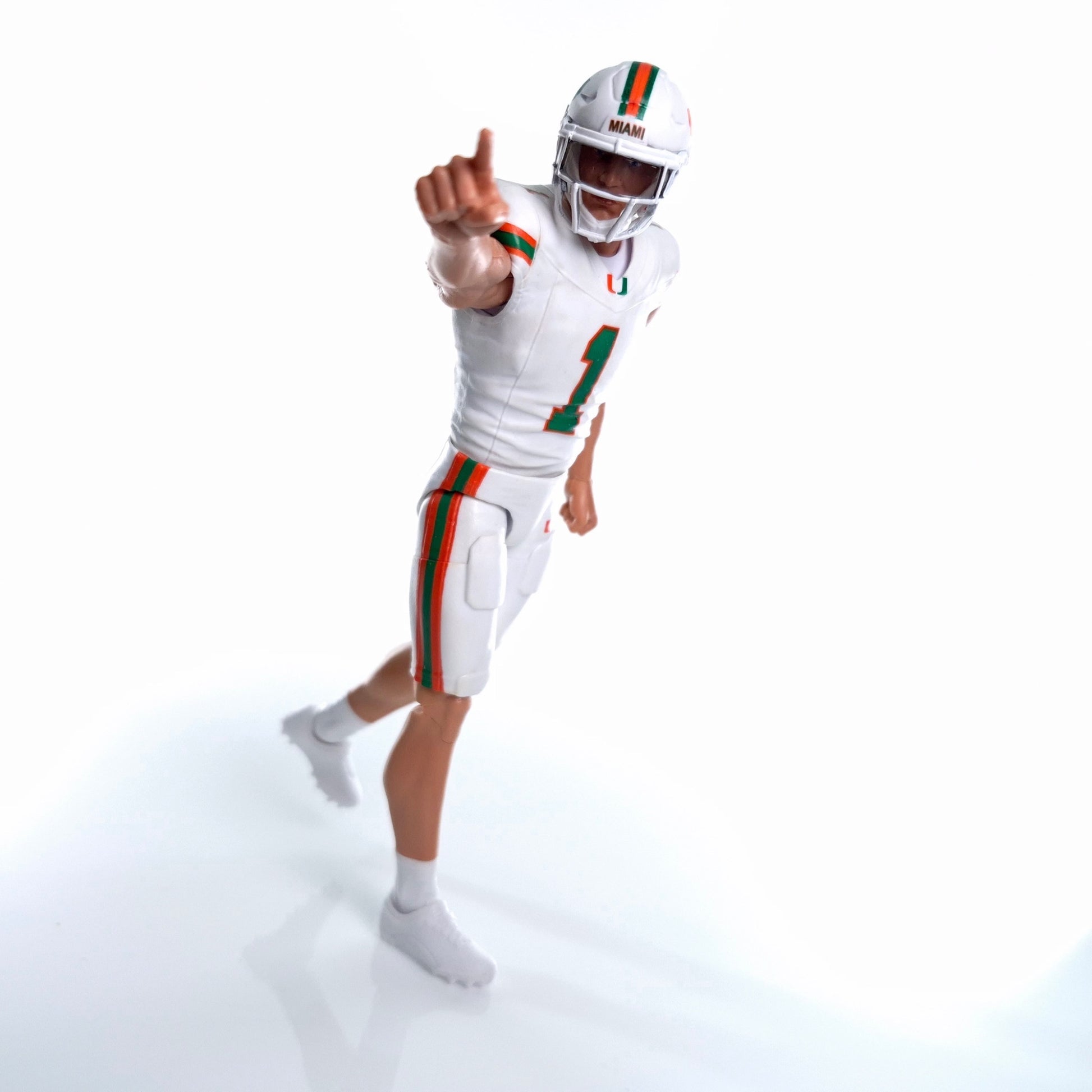 Collegiate Legends Miami Hurricanes #1 football action figure in white uniform pointing forward on white background
