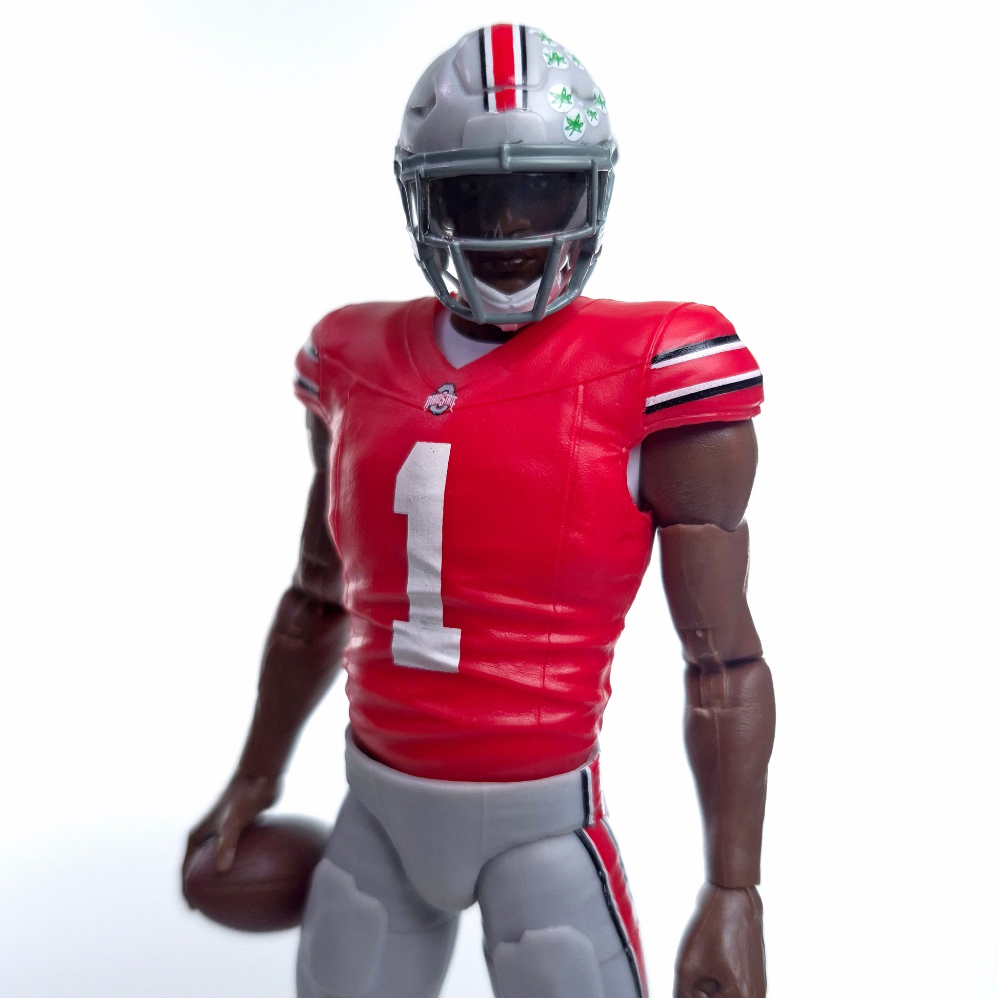 Collegiate Legends Ohio State #1 football action figure in scarlet and gray uniform holding a football