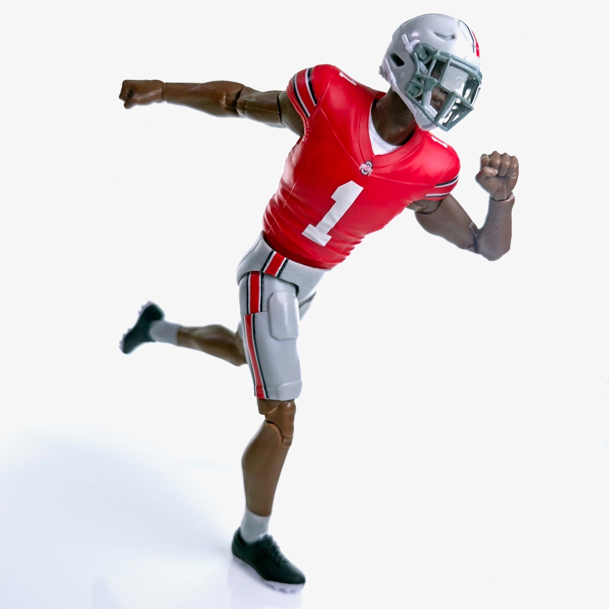 Collegiate Legends Ohio State #1 football action figure in a running pose wearing a scarlet and gray uniform