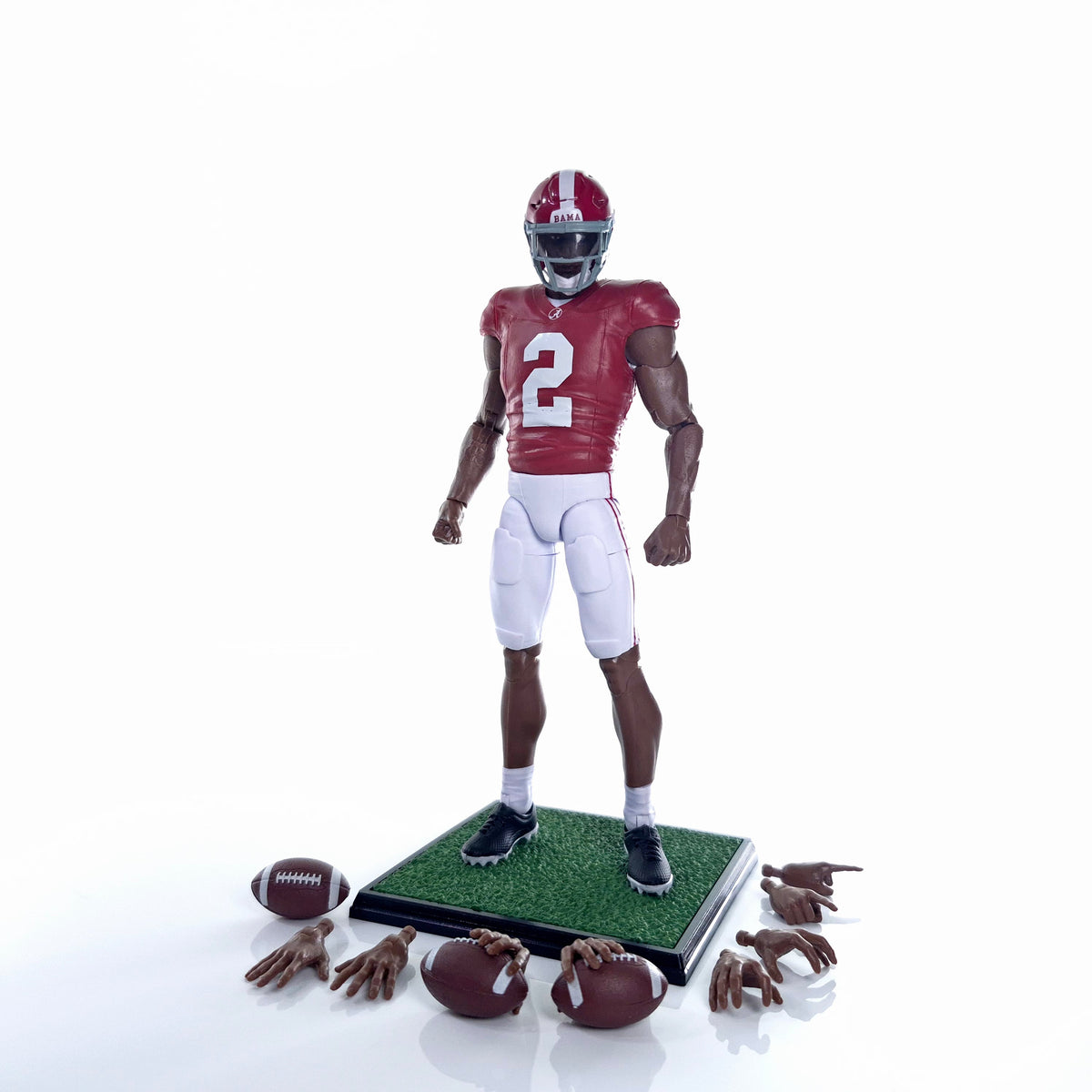 Collegiate Legends Ryan Williams Alabama action figure in crimson jersey with football, display stand, and accessories.