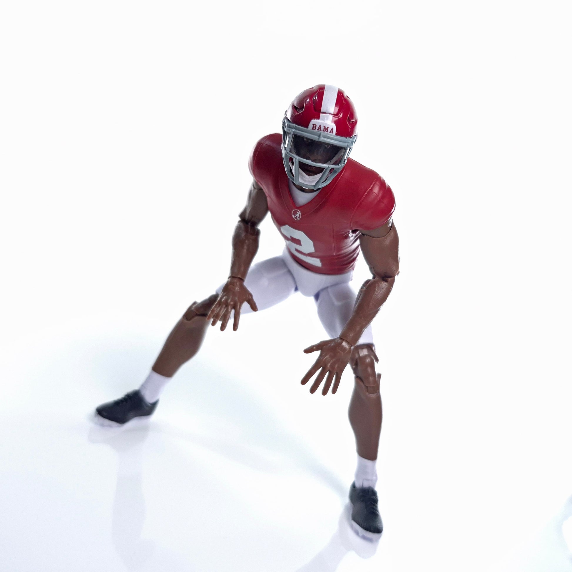 Collegiate Legends Ryan Williams 6-inch action figure in Alabama Crimson Tide jersey posed in a dynamic stance