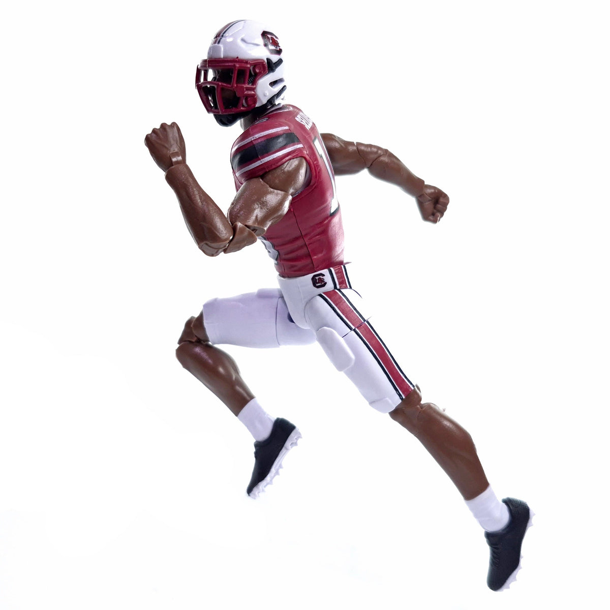 Collegiate Legends South Carolina #1 football action figure in a running pose wearing a garnet and white uniform