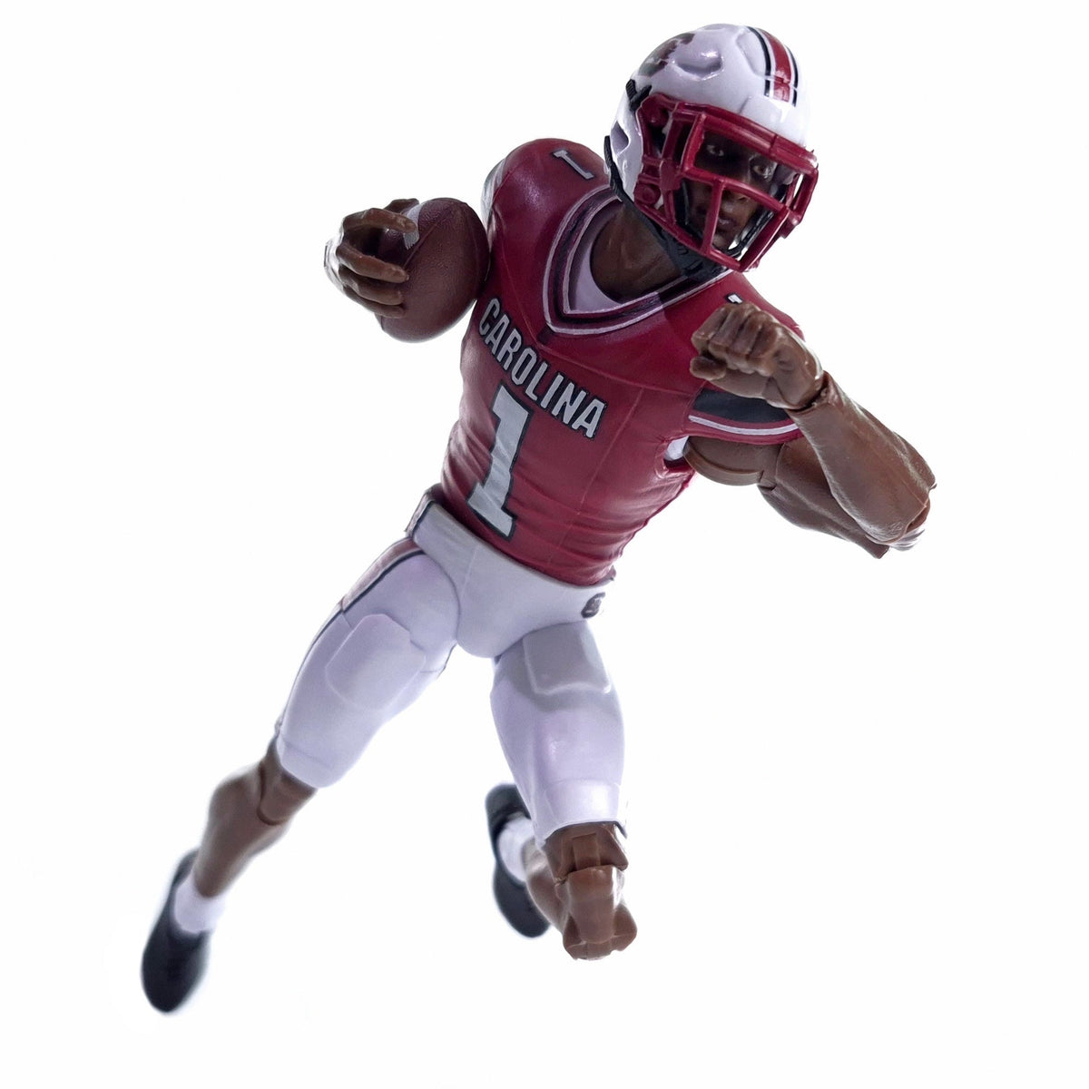 Collegiate Legends South Carolina football action figure wearing a garnet and black number 1 jersey holding a football
