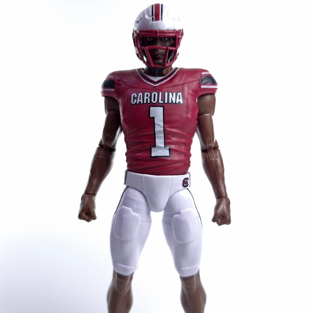 Collegiate Legends South Carolina football action figure wearing a garnet #1 jersey and white pants with helmet