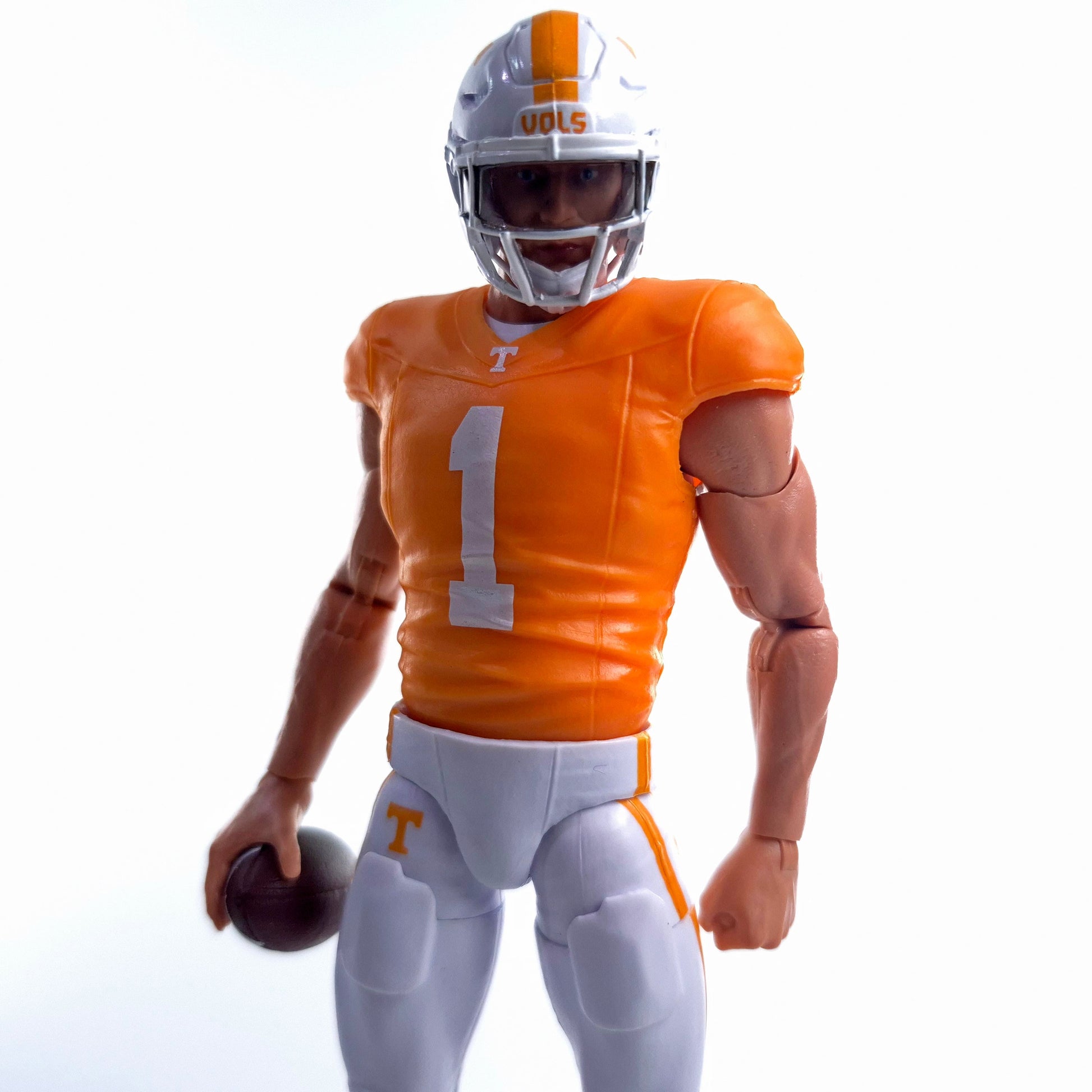 Collegiate Legends Tennessee football action figure wearing a number 1 orange and white jersey and holding a football