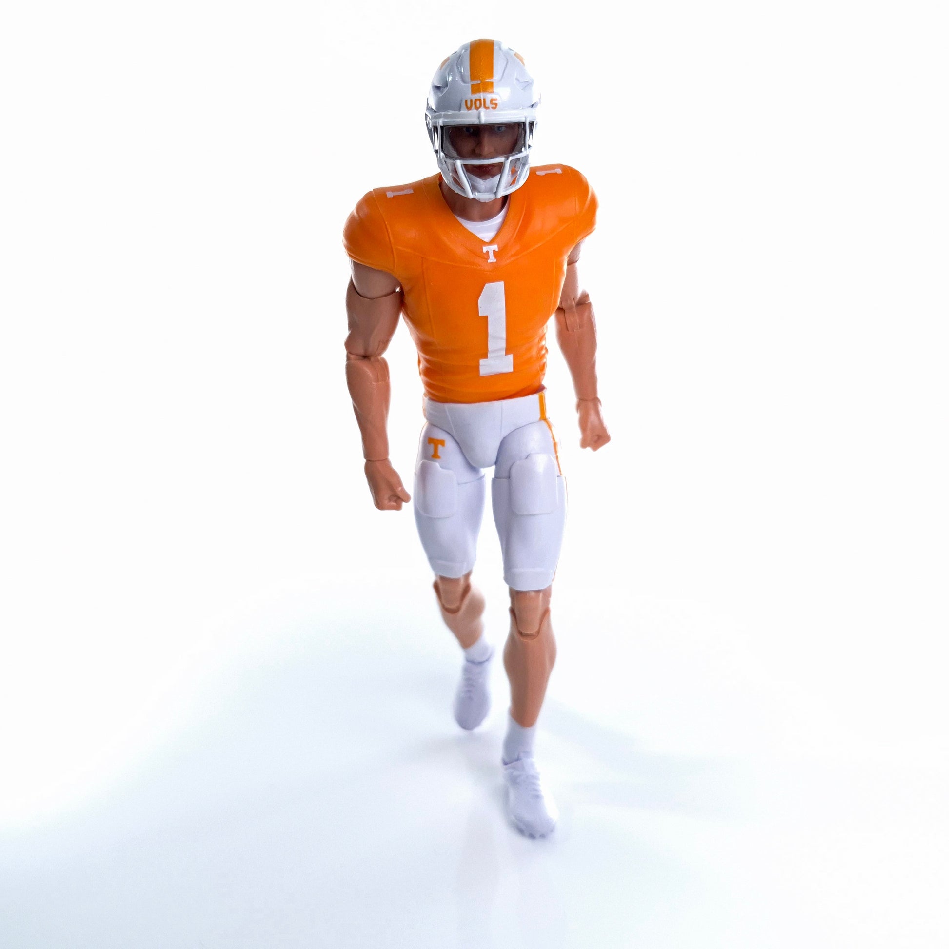 Collegiate Legends Tennessee Volunteers #1 football action figure in orange and white uniform walking forward