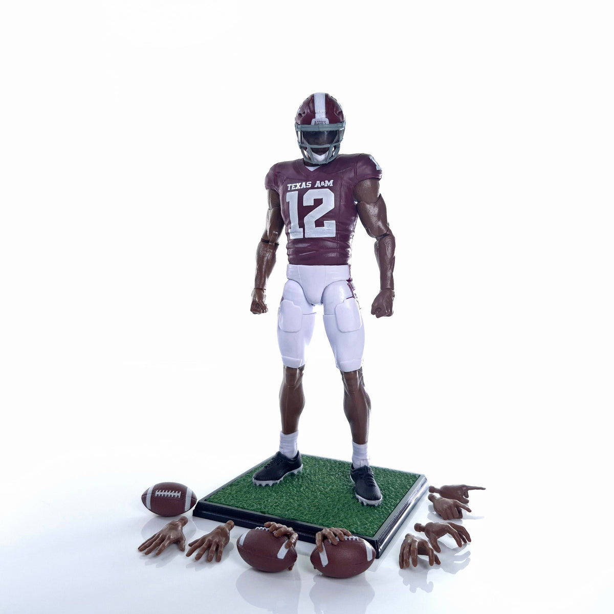 Collegiate Legends Texas A&M #12 football action figure in maroon and white uniform with display stand and accessories