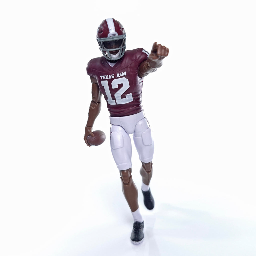 Collegiate Legends Texas A&M #12 football action figure in maroon and white uniform pointing forward with a football