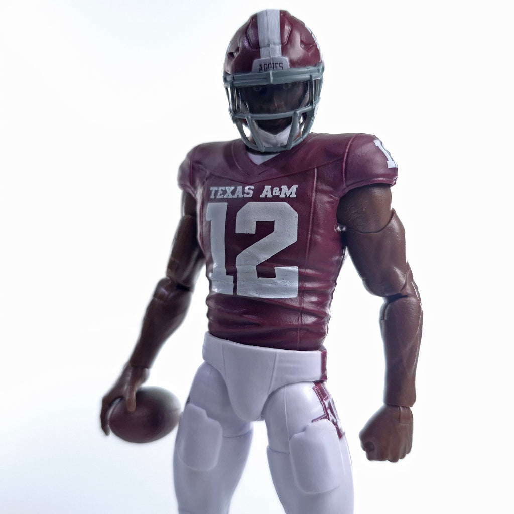 Collegiate Legends Texas A&M #12 football action figure in maroon and white uniform with helmet and football