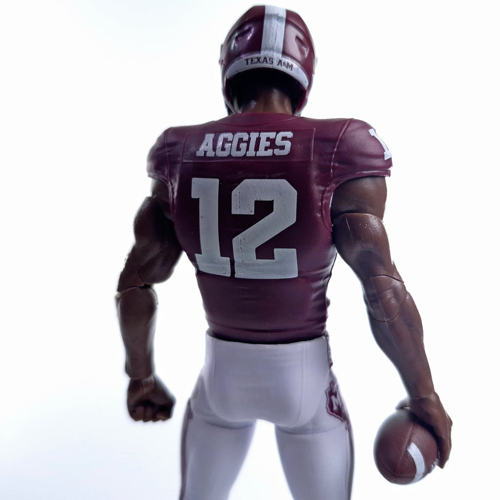 Collegiate Legends Texas A&M #12 football action figure in maroon and white uniform, back view holding a football.
