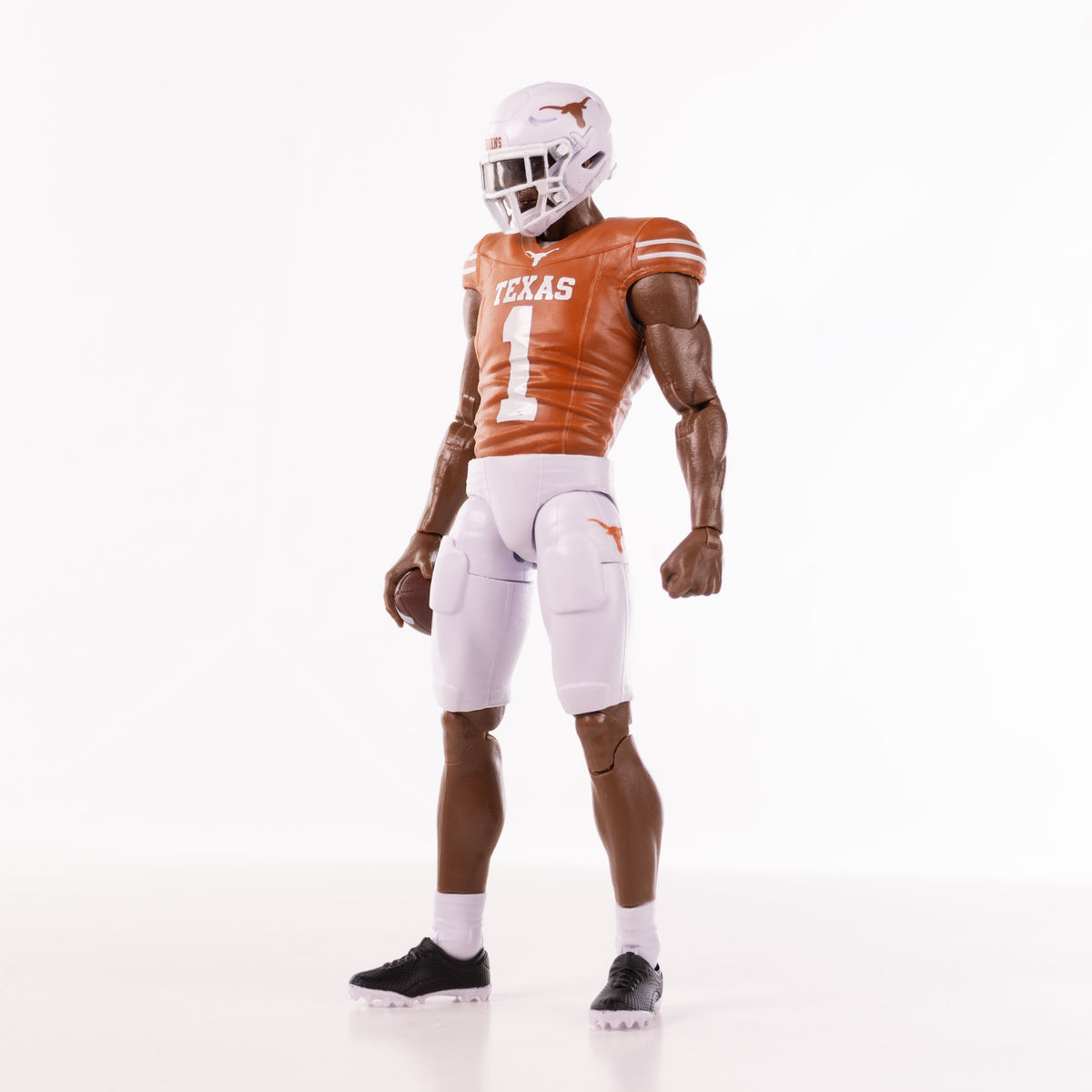 Collegiate Legends Texas Longhorns #1 football action figure in burnt orange jersey and white pants with helmet