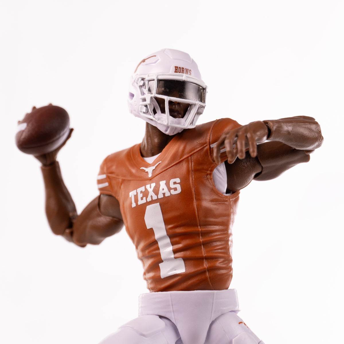 Collegiate Legends Texas Longhorns #1 football action figure in burnt orange jersey throwing a football